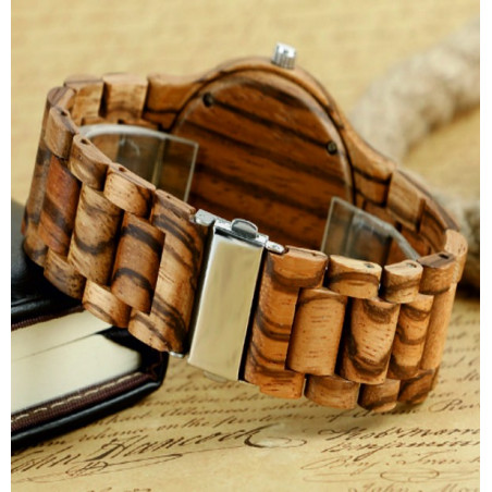 Wooden wristwatch made from natural materials. Watches for men and women. Wooden wristwatch made from natural materials. Watches for men and women.