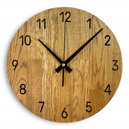 Wooden wall clock made of oak wood Wooden wall clock made of oak wood
