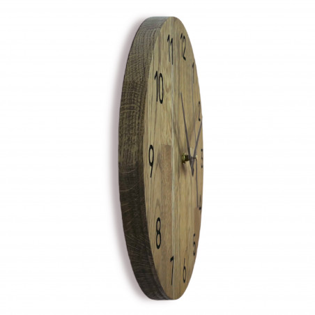 Wooden wall clock made of oak wood Wooden wall clock made of oak wood