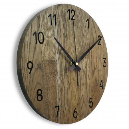 Wooden wall clock made of oak wood Wooden wall clock made of oak wood