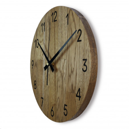 Wooden wall clock made of oak wood Wooden wall clock made of oak wood