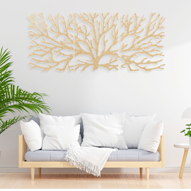 Wooden picture on the wall branches of plywood poplar. The picture consists of three parts