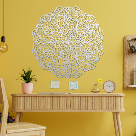 Elegant wooden mandala on the wall in a modern boho style interior