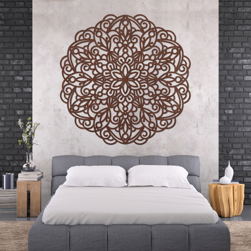 Elegant wooden mandala on the wall in a modern boho style interior