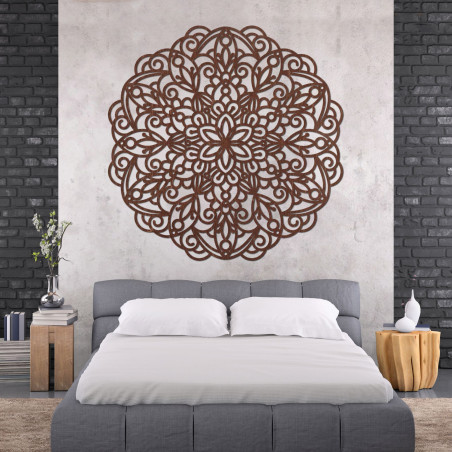 Elegant wooden mandala on the wall in a modern boho style interior