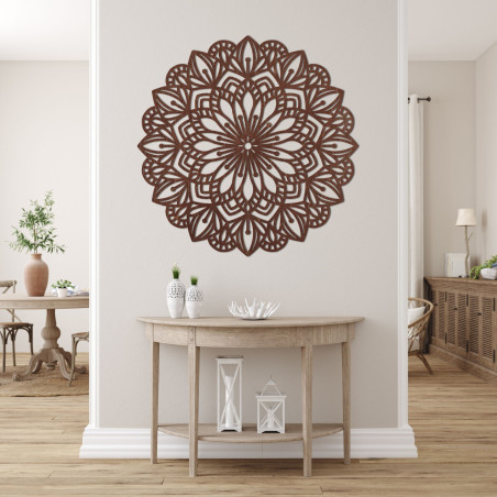 Wooden mandala for the wall with a precisely carved ornamental pattern