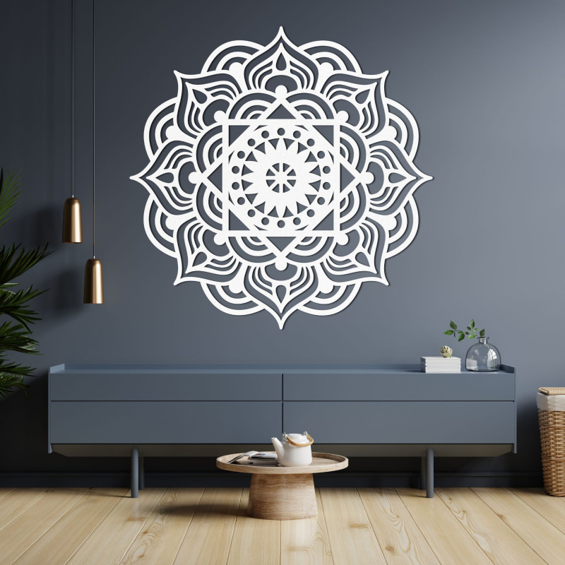 Wooden mandala on the wall as a painting