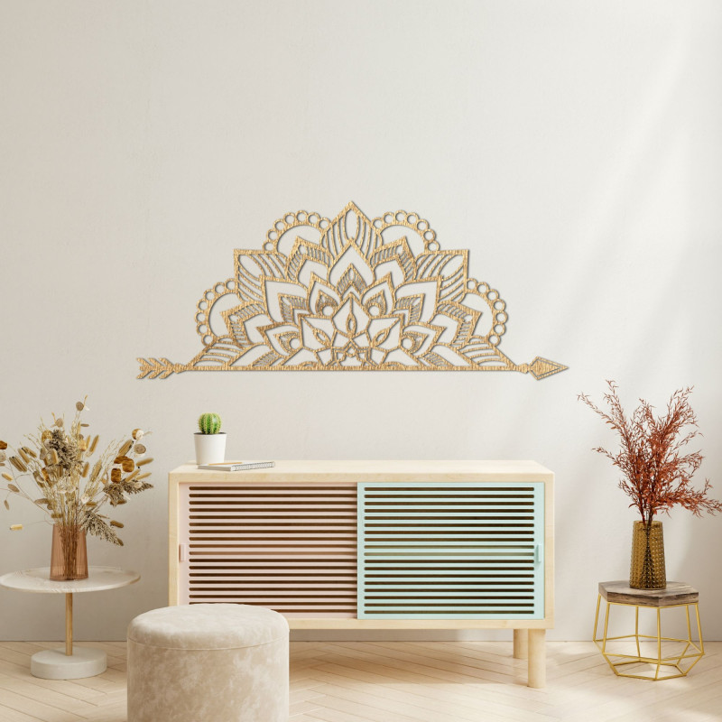 Wooden mandala on the wall with a delicate ornamental pattern as an elegant decoration for the interior