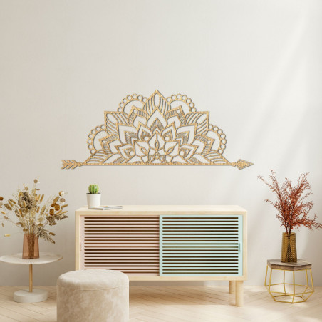 Wooden mandala on the wall with a delicate ornamental pattern as an elegant decoration for the interior