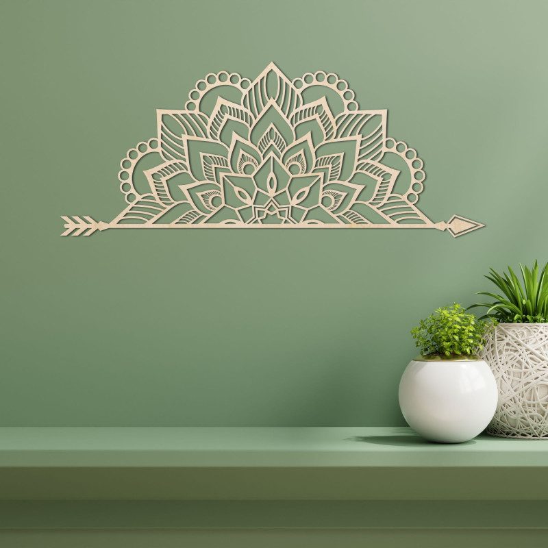 Wooden mandala on the wall with a delicate ornamental pattern as an elegant decoration for the interior