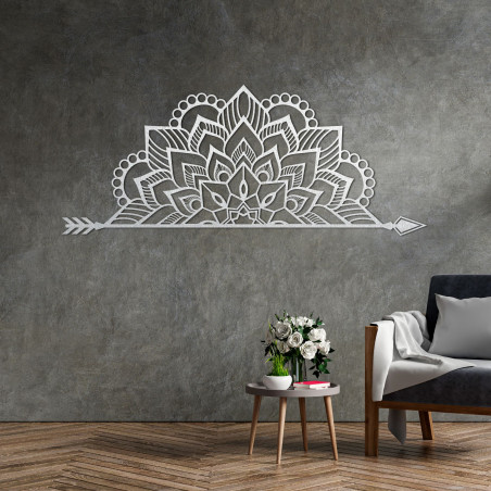 Wooden mandala on the wall with a delicate ornamental pattern as an elegant decoration for the interior