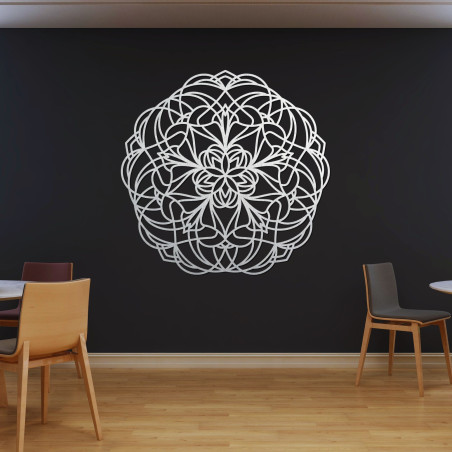 Wooden mandala on the wall with a modern geometric pattern