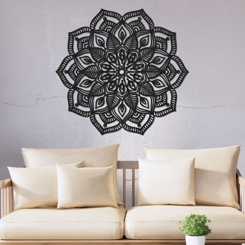Wooden mandala on the wall with a detailed ornamental pattern for a modern interior