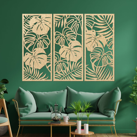 Modern wooden picture with tropical monstera leaves on the wall