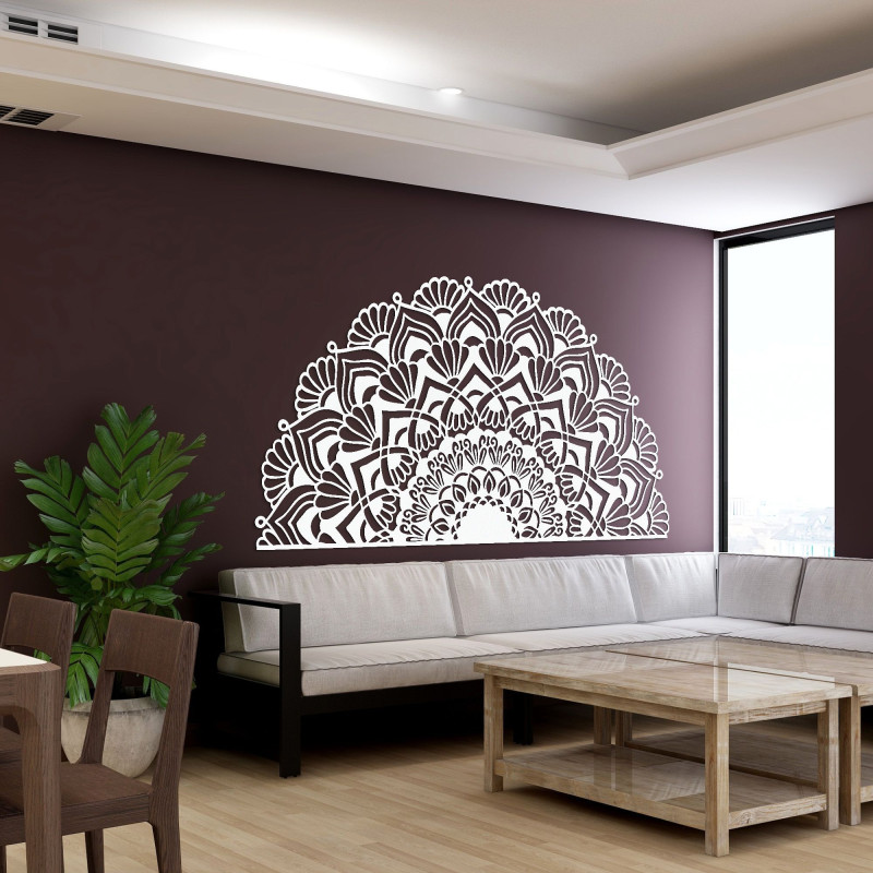 Luxurious wooden mandala on the wall in an elegant boho style interior