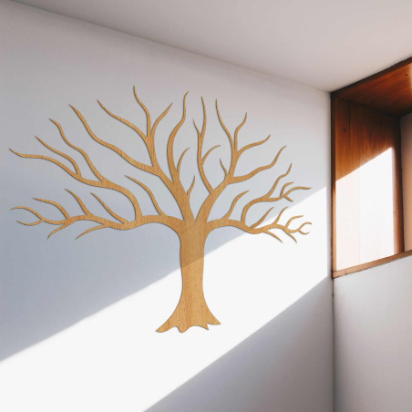 Wooden picture on the wall with tree branches