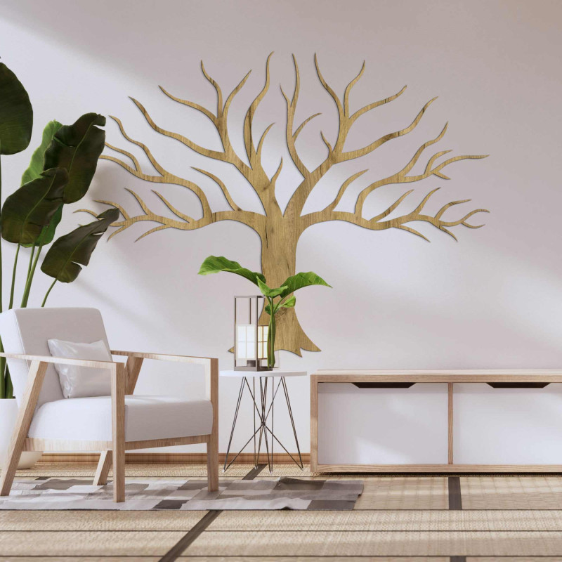 Wooden picture on the wall with tree branches