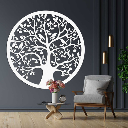 Circular wooden decoration Tree of Life in black design above the chest of drawers.