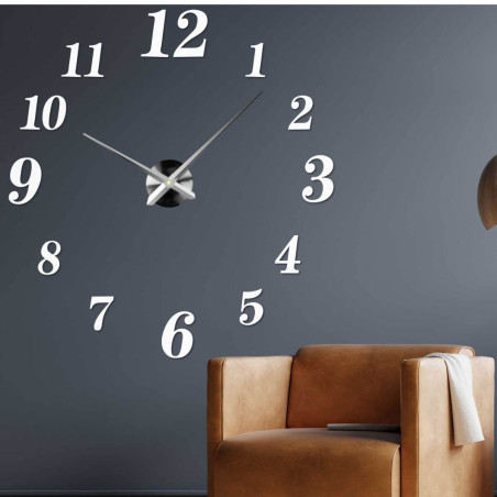 Modern plexiglass wall clock showing 3 o'clock in the afternoon Modern plexiglass wall clock showing 3 o'clock in the afternoon