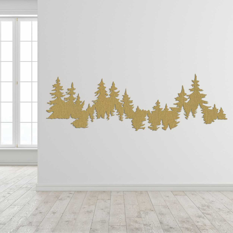 Close-up view of a forest silhouette made of wood mounted on a white wall.