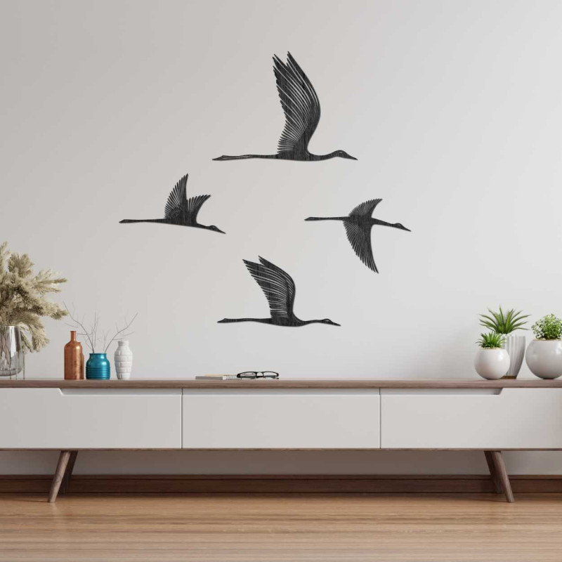 Detailed silhouette of birds in flight carved from quality wood