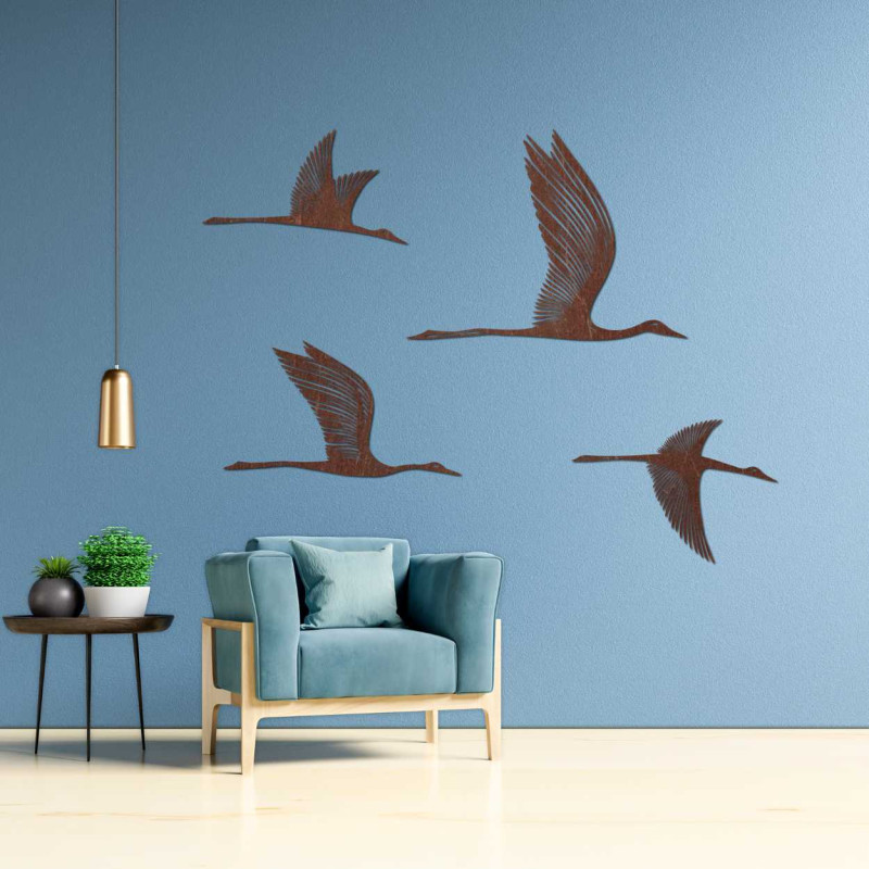 Detailed silhouette of birds in flight carved from quality wood