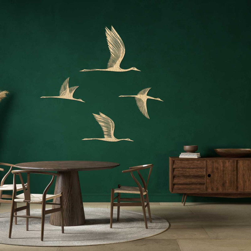 Detailed silhouette of birds in flight carved from quality wood