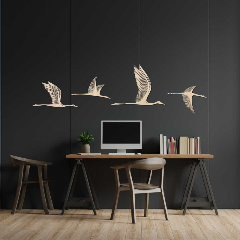 Detailed silhouette of birds in flight carved from quality wood