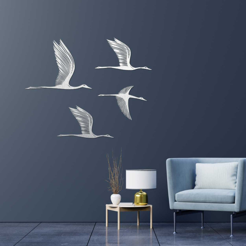 Detailed silhouette of birds in flight carved from quality wood