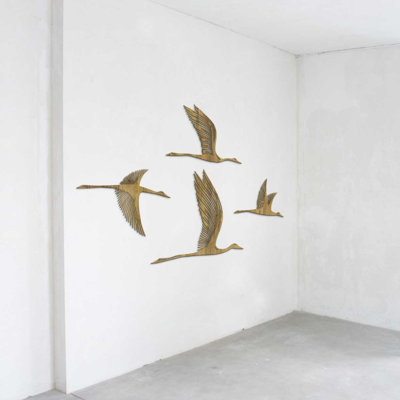 Minimalist wooden bird design mounted on interior wall
