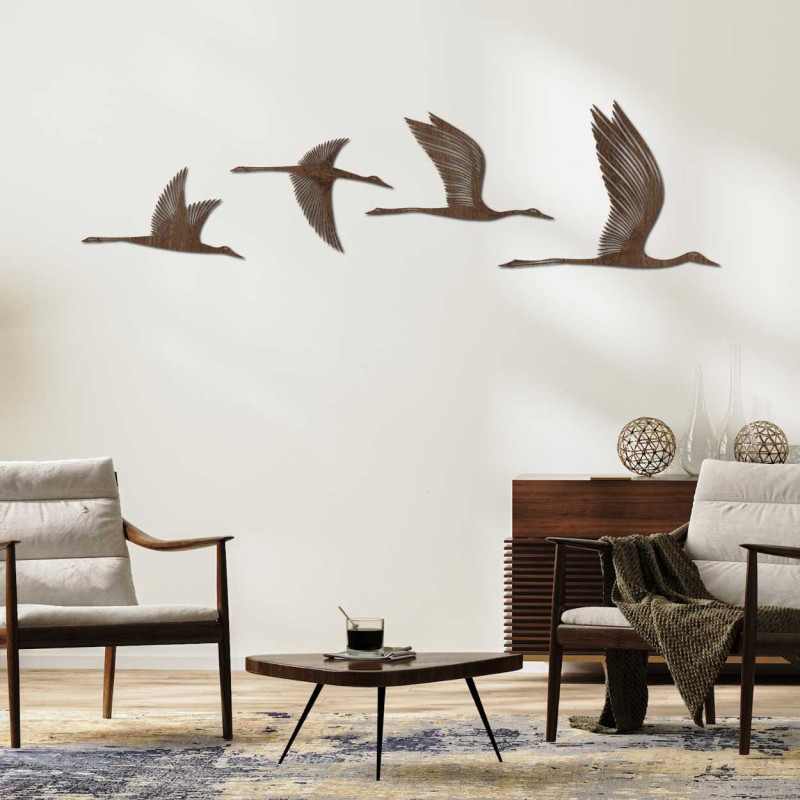 Stylish wooden painting with the motif of movement and freedom of bird flight