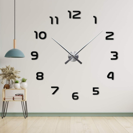 Frameless clock with central mechanism and long hands.