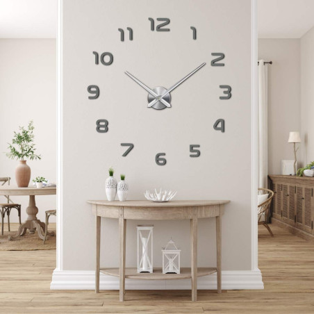 A clock with a large diameter and a central point for attaching the hands.