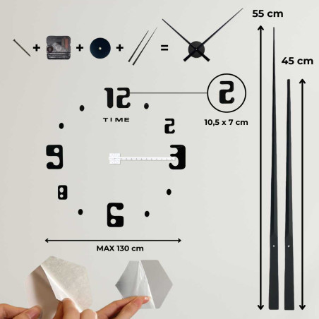 Stylish wall clock with silver hands and distinctive geometric numerals.