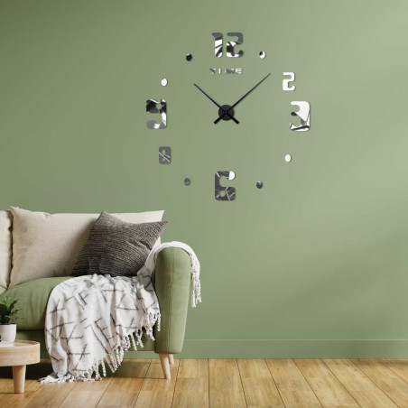 Wall clock with unconventionally arranged numbers and the inscription TIME at the number twelve.