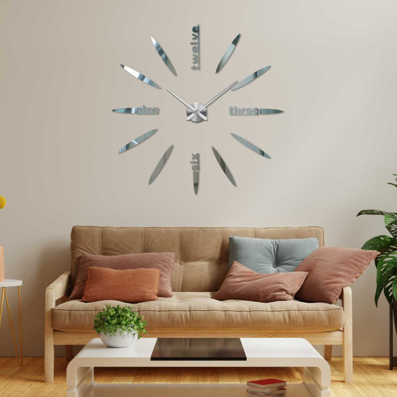 Detail of a 3D clock with a modern dial, oval elements and legible word inscriptions.