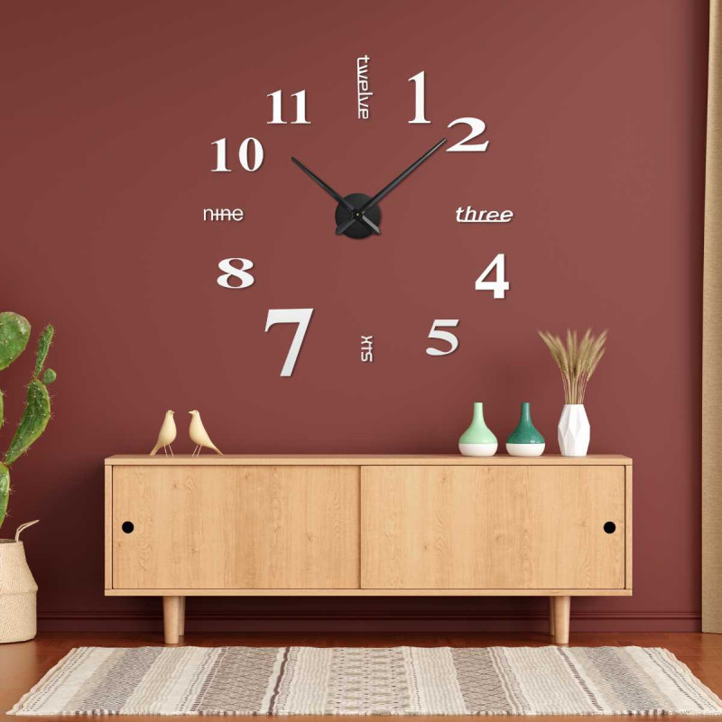 Designer sticker clock with numbers displayed in different font styles.