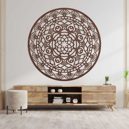A decoration in the shape of a circle with a complex, regularly repeating ornamental pattern. A decoration in the shape of a circle with a complex, regularly repeating ornamental pattern.