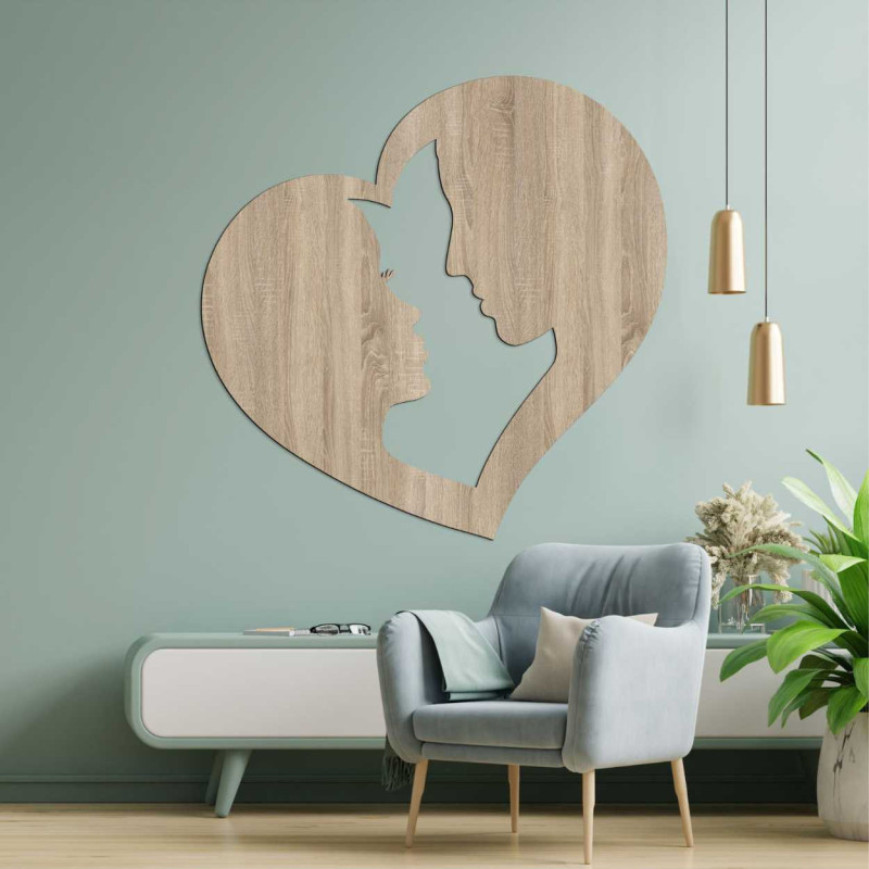 Decoration depicting the silhouette of a man and a woman in profile enclosed in one heart.