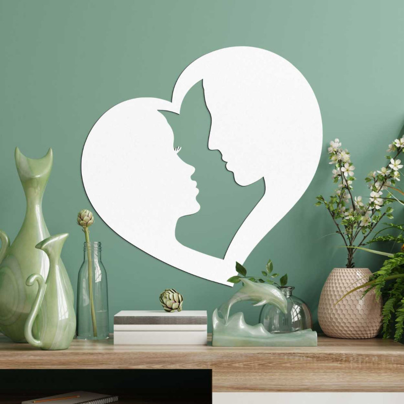 Decoration depicting the silhouette of a man and a woman in profile enclosed in one heart.