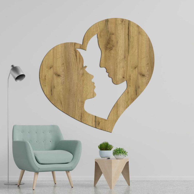 Decoration depicting the silhouette of a man and a woman in profile enclosed in one heart.