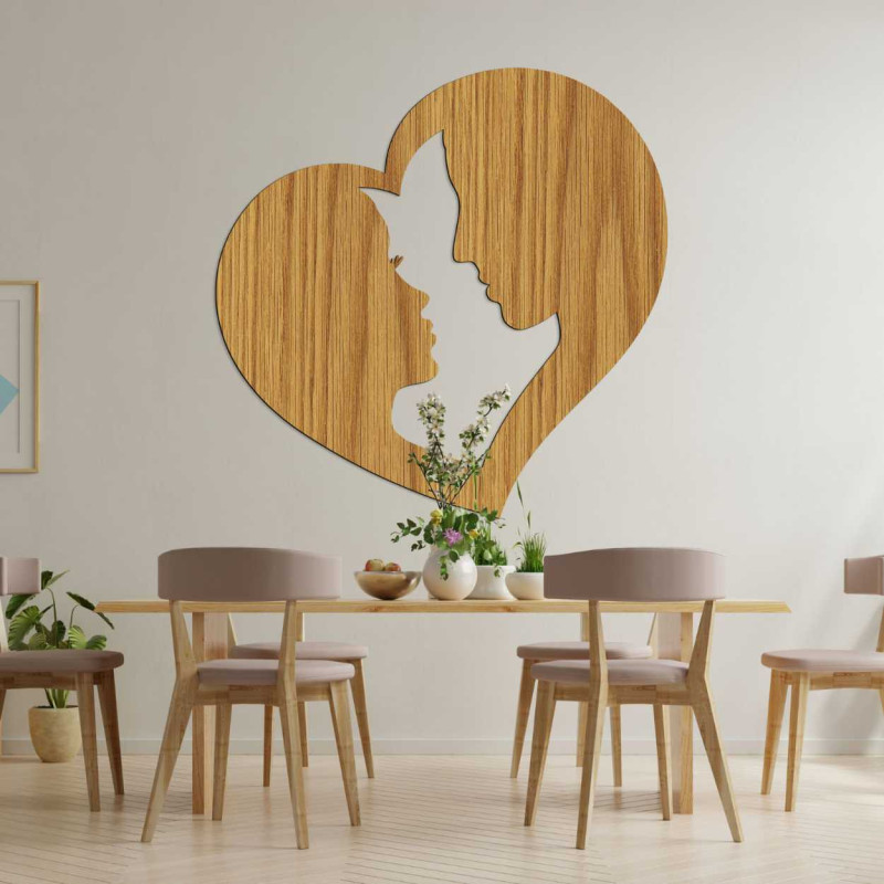 Decoration depicting the silhouette of a man and a woman in profile enclosed in one heart.