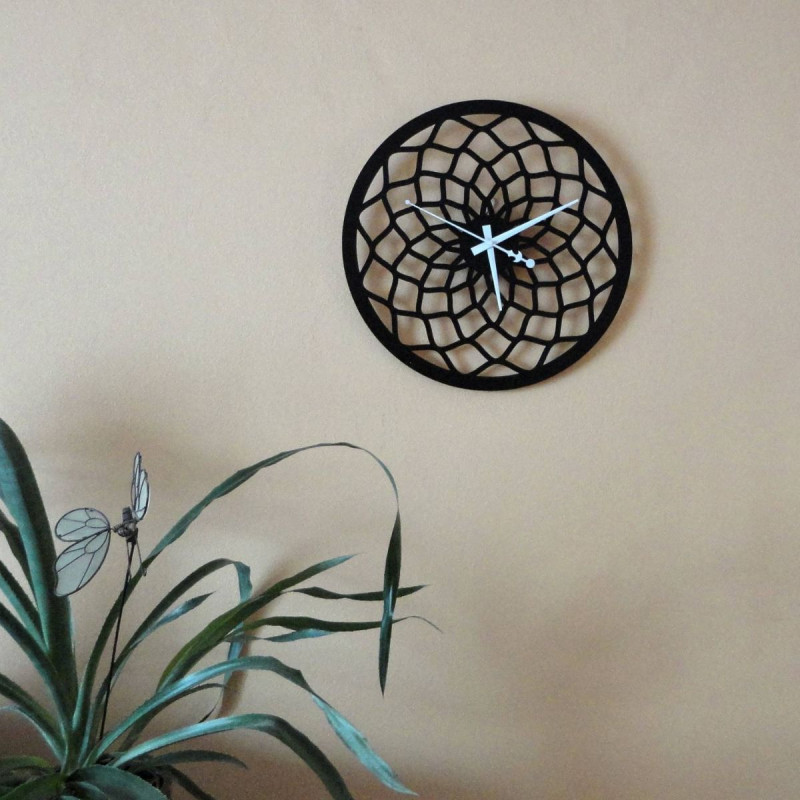 Black wall clock with geometric