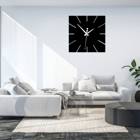 Square wall clock with minimalist design and contrasting elements Square wall clock with minimalist design and contrasting elements