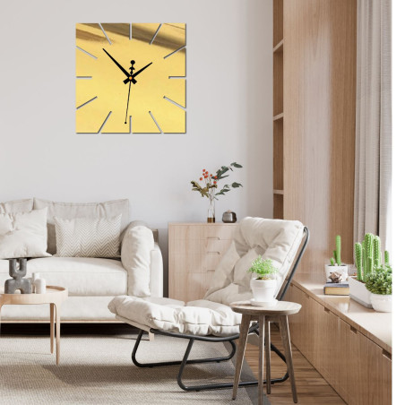 Black wall clock without numbers with a modern design Black wall clock without numbers with a modern design