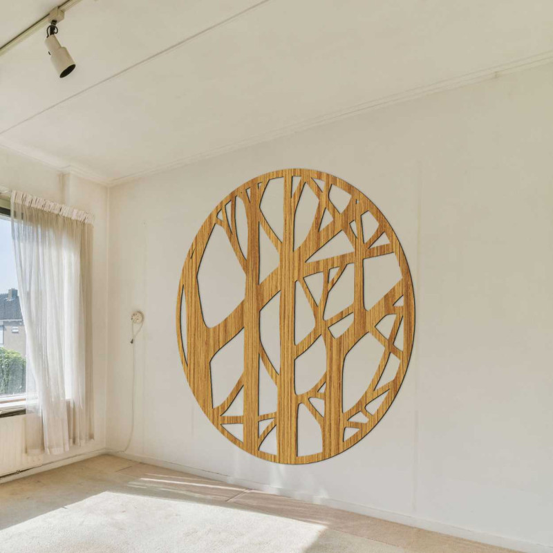 Minimalist decoration with branches in a circular wooden frame