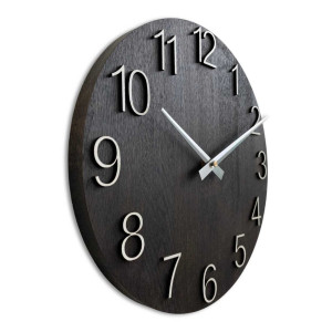 Wooden wall clock with carved numbers and metal hands. 2