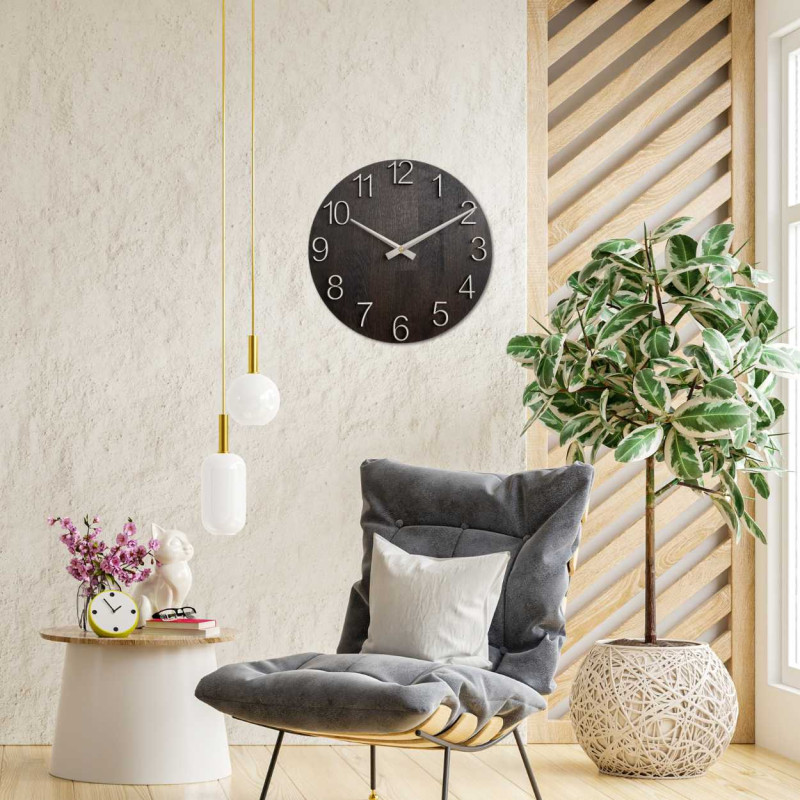 Round clock made of wood with a subtle, natural look.