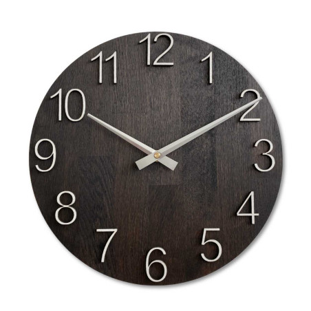 Handcrafted clock with a wooden base and fine details of the numbers.