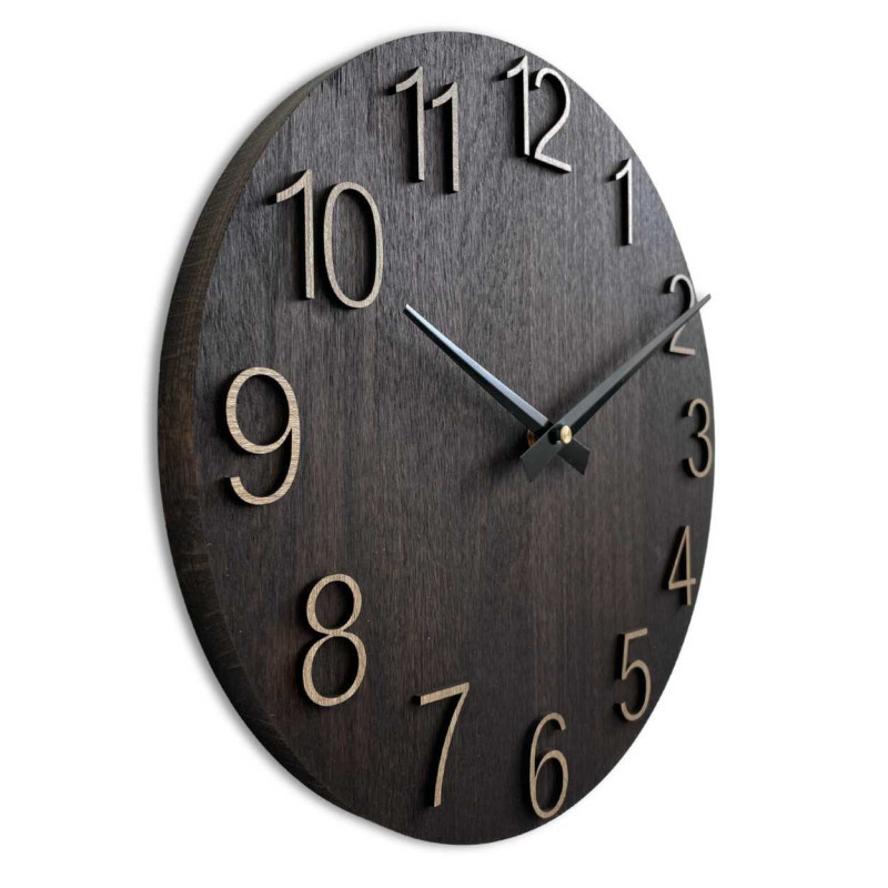 Handcrafted clock with a wooden base and fine details of the numbers.